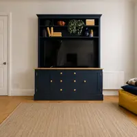 Navy blue painted 5ft TV media dresser with an open display shelf above the television, a solid oak worktop, and three drawers between two cupboards below, on herringbone flooring