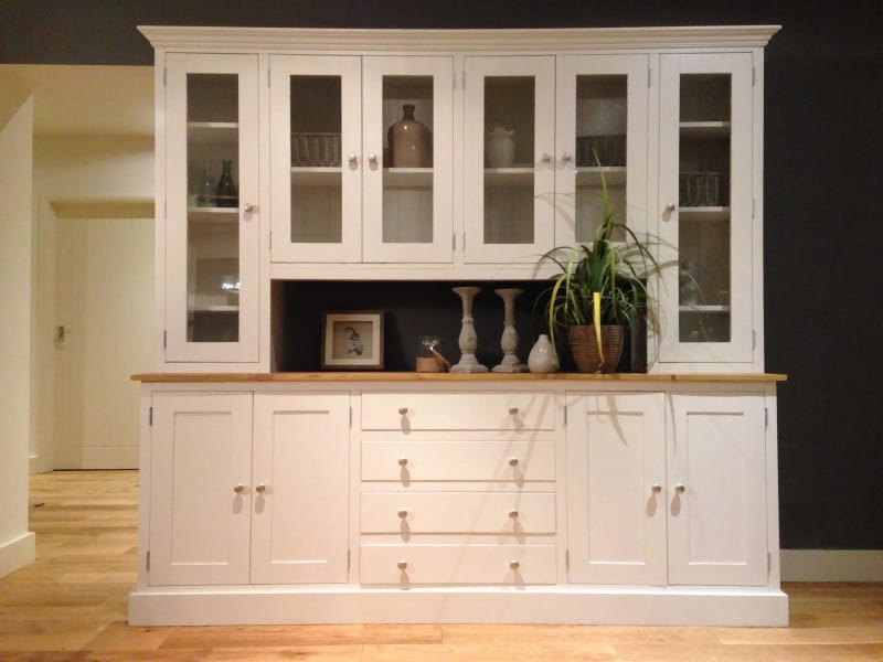 Cream painted 7ft Welsh dresser with six glazed upper doors around a central open shelf, above an oak worktop, four drawers and four cupboard doors