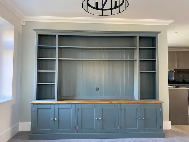 Blue-grey painted media dresser with an oak worktop, open shelving above and six cupboards below