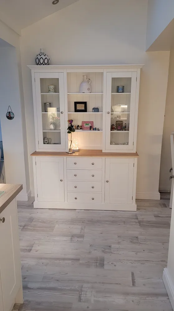 Cream painted welsh dresser with glazed doors, four drawers and an oak top