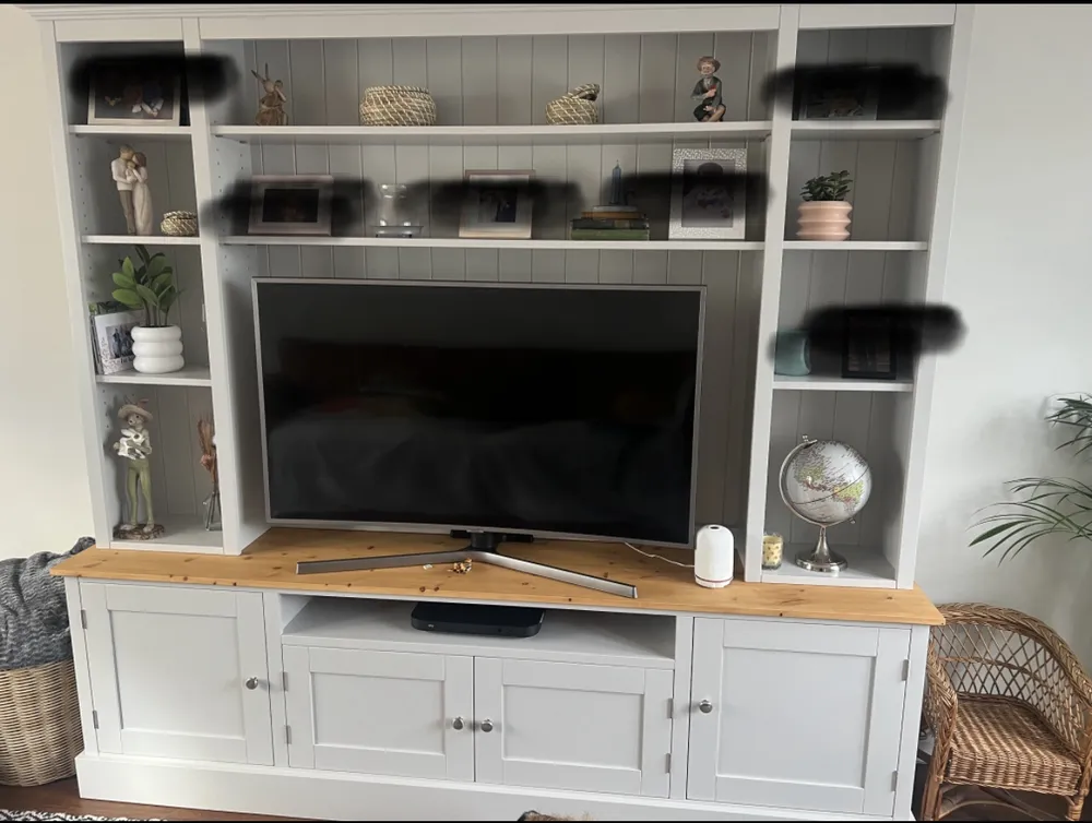 Light grey TV dresser with tongue and groove back, shelves and a waxed pine top